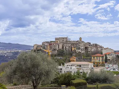 a town on top of a hill with houses at Holiday Home Le Mas de Gattières by Interhome in Gattières