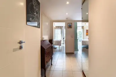 a hallway with a door leading to a bedroom at Jardin Wilson AP4455 by RIVIERA HOLIDAY HOMES in Nice