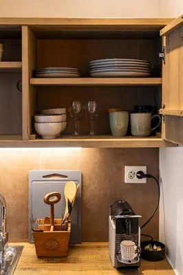a kitchen with a counter top with a microwave at Studio à 2min à pieds de la mer et du Casino in Beaulieu-sur-Mer