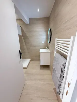a small bathroom with a bunk bed and a sink at appartement port de Nice 4pers emplacement idéal in Nice