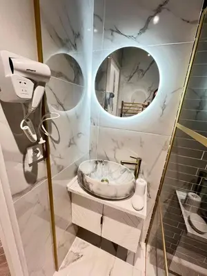 a bathroom with a sink and a mirror at MOON - 34 in Nice