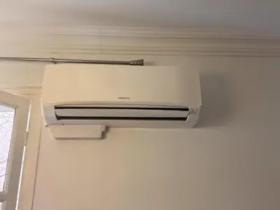 a printer hanging on a wall in a room at FLEUR- Cosy Studio, 200 Promenade des Anglais et Negresco, wifi, climatisation- calme in Nice