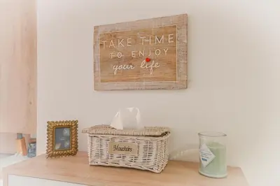 a sign that says take time to enjoy your life at Le Duplex in Villefranche-sur-Mer