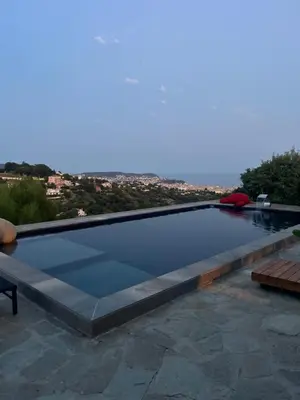 a swimming pool with a view of a city at Villa location saisonniere in Nice