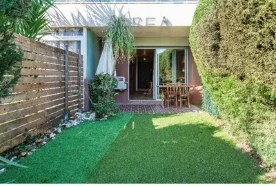 a house with a yard with green grass at Nice Absea Belles Terres Studio in Nice