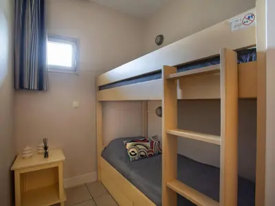 a bunk bed in a room with a bunk bedutenewayewayangering at Apartment Heliotel Marine-2 by Interhome in Saint-Laurent-du-Var