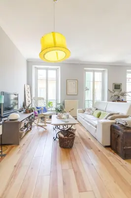 a green bedroom with a bed and a mirror at Blue appart - centre ville - gare in Nice