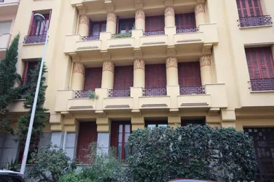 a large building with balconies on the side of it at Appartement 50m2 proche mer in Nice