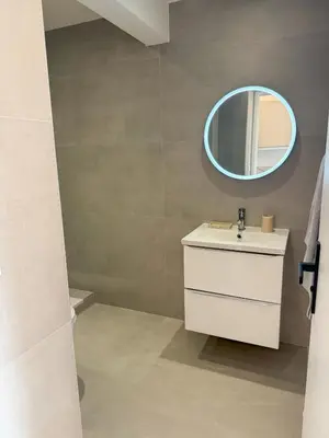 a bathroom with a sink and a mirror at Port de Nice, Appartement 4pers emplacement idéal tout équipé balcon in Nice