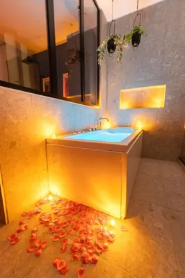a bathroom with a sink with lights on the floor at Nice Centre - Loft - Balnéo 1 in Nice