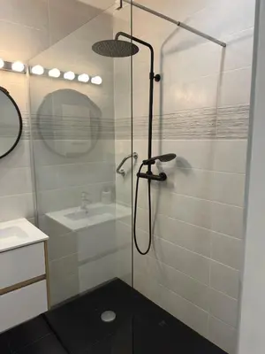a bathroom with a shower and a sink at Spacious Riviera Studio in Nice