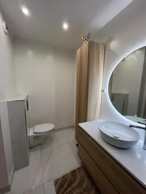 a bathroom with a sink and a mirror at 2P cosy à Nice in Nice