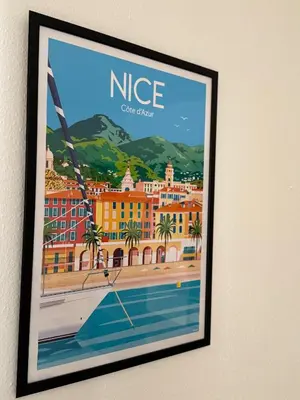 a poster hanging on the wall of a hotel at Bel appartement au calme hyper centre Nice in Nice