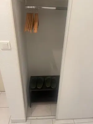 a walk in closet with a door open at Cœur de Nice in Nice