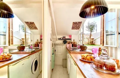 a kitchen with a counter with fruits on it at Nice - Little Studio with Sunny Terrace in Nice