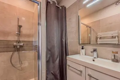 a bathroom with a shower and a sink at Contemporary 2P Studio Just Steps from the Beach in Cagnes-sur-Mer