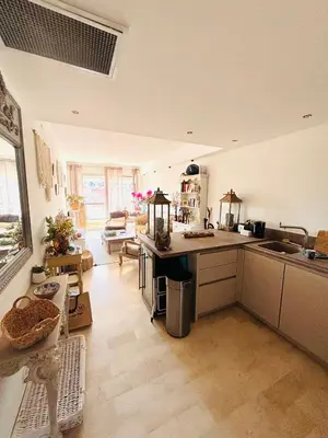a kitchen with a sink and a counter top at Les Floralies - Beaulieu-sur-Mer in Beaulieu-sur-Mer