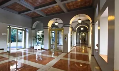 a large room with a lobby with vaulted ceilings at Beautiful studio with parking place Massena in Nice