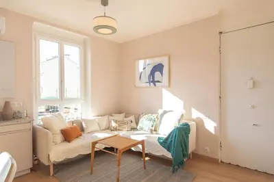 a living room with a couch and a table at #25 2BDR Port, 5min from the Old Town Balcony, AC&WIFI in Nice