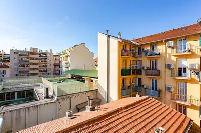 a view of the roofs of buildings in a city at #25 2BDR Port, 5min from the Old Town Balcony, AC&WIFI in Nice