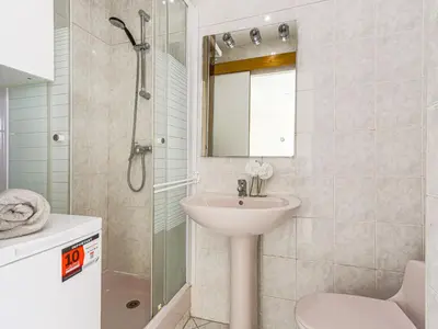 a bathroom with a sink and a shower at Apartment Le Mirazur by Interhome in Nice