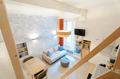an overhead view of a living room with a couch at New- Cozy apartment -4 guests - Air conditioning in Nice