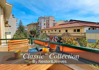a balcony with a view of a city at Nestor&Jeeves - PANTAI - Near Beach - Balcony in Nice