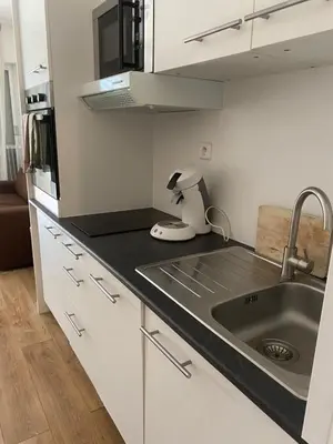 a kitchen with a sink and a counter top at Studio Nice clim wifi in Nice
