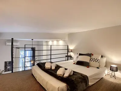 a bedroom with a large bed with white pillows at Nestor&Jeeves - VOGUE BEACH - Central - Near Beach in Nice