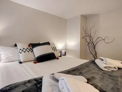 a bedroom with two beds with pillows on them at Nestor&Jeeves - VOGUE BEACH - Central - Near Beach in Nice