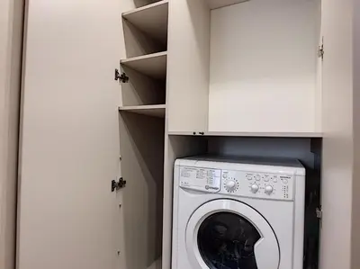 a washer and dryer in a kitchen with white cabinets at Nestor&Jeeves - VOGUE BEACH - Central - Near Beach in Nice