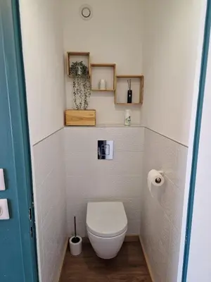 a small bathroom with a toilet in a room at Chez Stella - Proche Mer in Nice