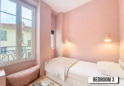 a bedroom with pink walls and a bed with a window at Nestor&Jeeves - PEPYTE - Design - Near Beach in Nice