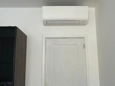 a microwave above a door with a white wall at L38 Hobeika Suite Fleur 7min Walk To Beach,Free Park,Balc&AC in Nice