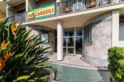 a building with a sign that reads pasadena at Sea View - Lovely Studio Promenade des Anglais in Nice