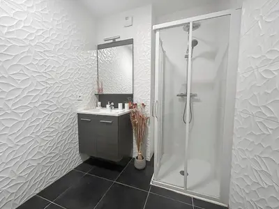 a bathroom with a shower and a sink at Fabron studio et Résidence de Luxe avec Piscine in Nice