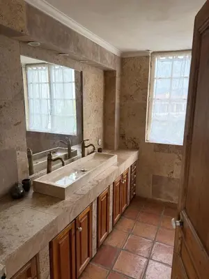 a bathroom with a sink and a mirror at maison de charme piscine au bord de mer in Cagnes-sur-Mer