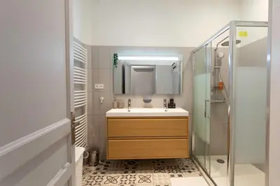 a bathroom with a sink and a shower at #34 Lamartine Central 3 Bdrs AC balcony 10mins walk to old town in Nice