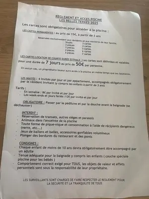 a letter with a page of documentation on it at Nice Absea Belles Terres A in Nice