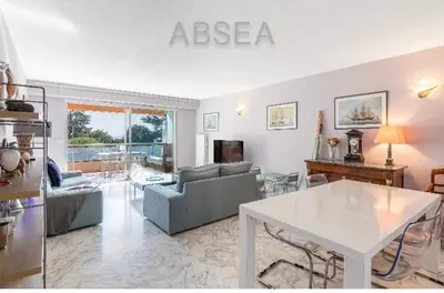 a living room with a couch and a table at Nice Absea Belles Terres A in Nice