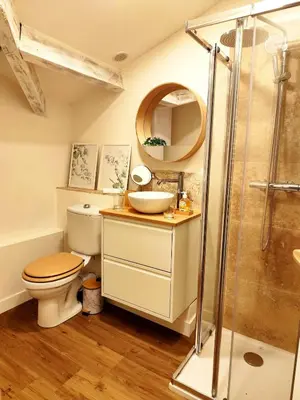 a bathroom with a toilet and a sink and a shower at Tribord Holiday House in Nice