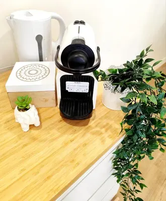 a coffee maker sitting on top of a counter at Tribord Holiday House in Nice