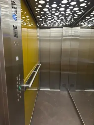 a row of elevators in a subway station at Studio et ses deux piscines in Nice