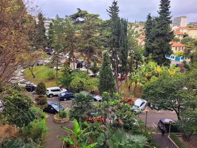 an aerial view of a parking lot with cars parked at Séjour chic proche de la mer in Nice