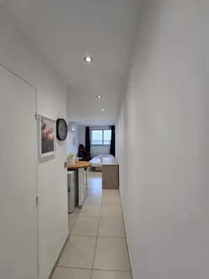 a hallway leading to a bedroom in a house at Sunny Prom Studio in Nice