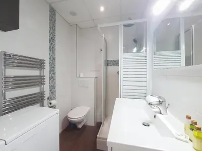 a white bathroom with a toilet and a sink at Nestor&Jeeves - DOLCE VITA STUDIO - Balcon - Central in Nice