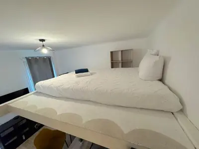 a living room with a loft bed and a living room at ⁂Appartement élégant plage à 100m prom des anglais in Nice