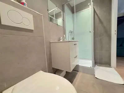 a bathroom with a shower and a toilet at ⁂Appartement élégant plage à 100m prom des anglais in Nice