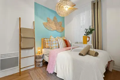 a bedroom with two beds with towels on them at Nice Renting - CLEMENCEAU - Riviera Cocoon Calm Elegance Design in Nice
