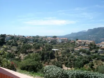 a view of a town with houses and trees at Beautiful Villa with large pool and garden 20 mn from Nice in Colomars